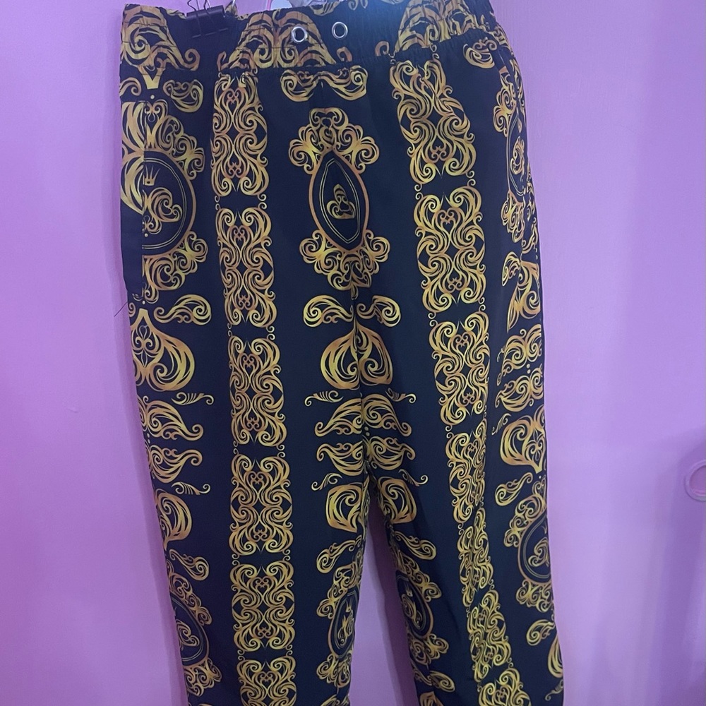 Black and gold sweat type pants